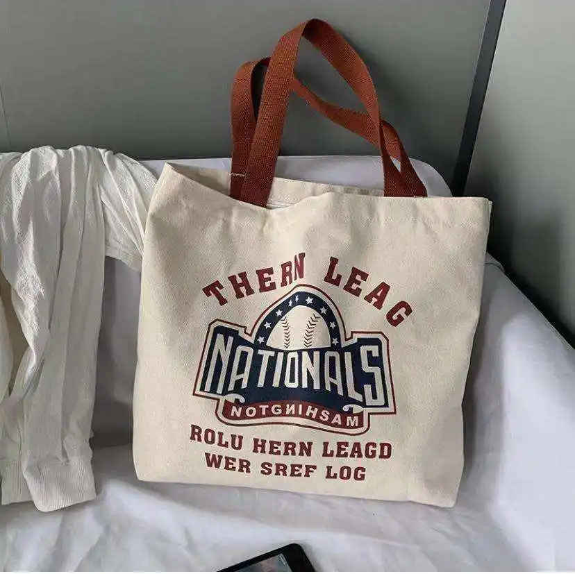 โรงงานเดิมออกแบบใหม่กระเป๋าผ้าฝ้ายผ้าแคนวาสแบบพกพาความจุขนาดใหญ่กระเป๋าช้อปปิ้ง